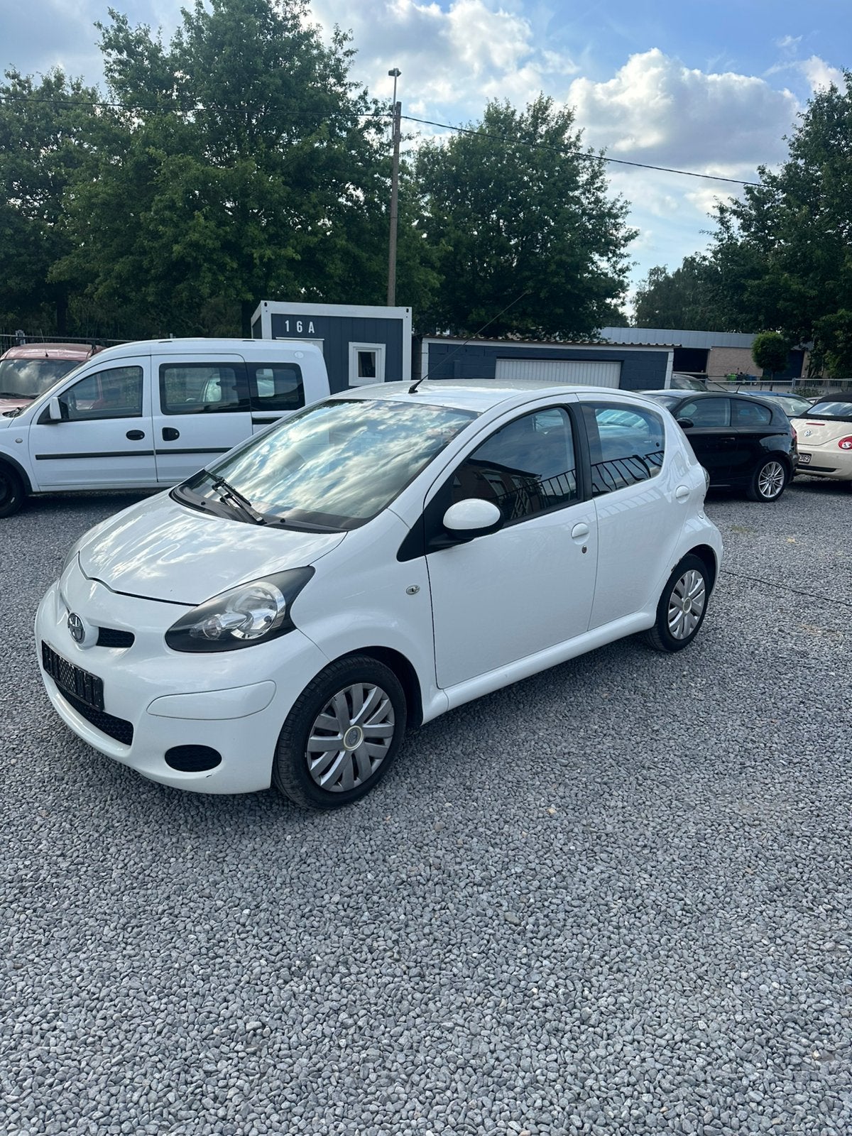 Toyota Aygo 1.0 Airco GEKEURD, Voorwielaandrijving, Stof, Zwart, Wit