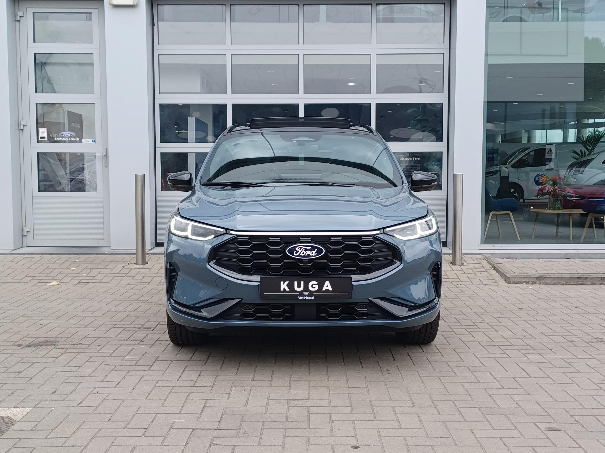 Ford Kuga 2.5i PHEV Aut. 178kW Bluecruise Edition - Pano dak, Auto's, Stof, 4 cilinders, Blauw, Plug-in hybride