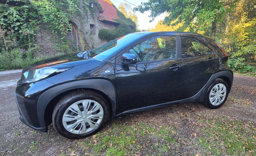 TOYOTA AYGO X, Auto's, Voorwielaandrijving, Dealer onderhouden, Stof, Zwart