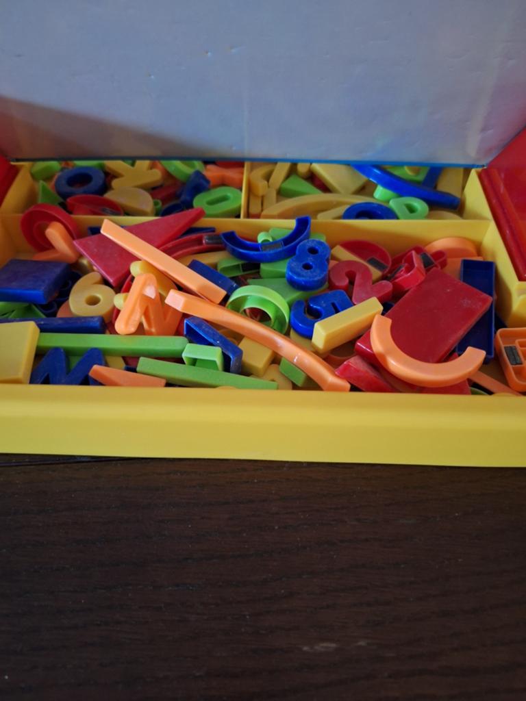 Magneetbord in draagkoffer, Ophalen