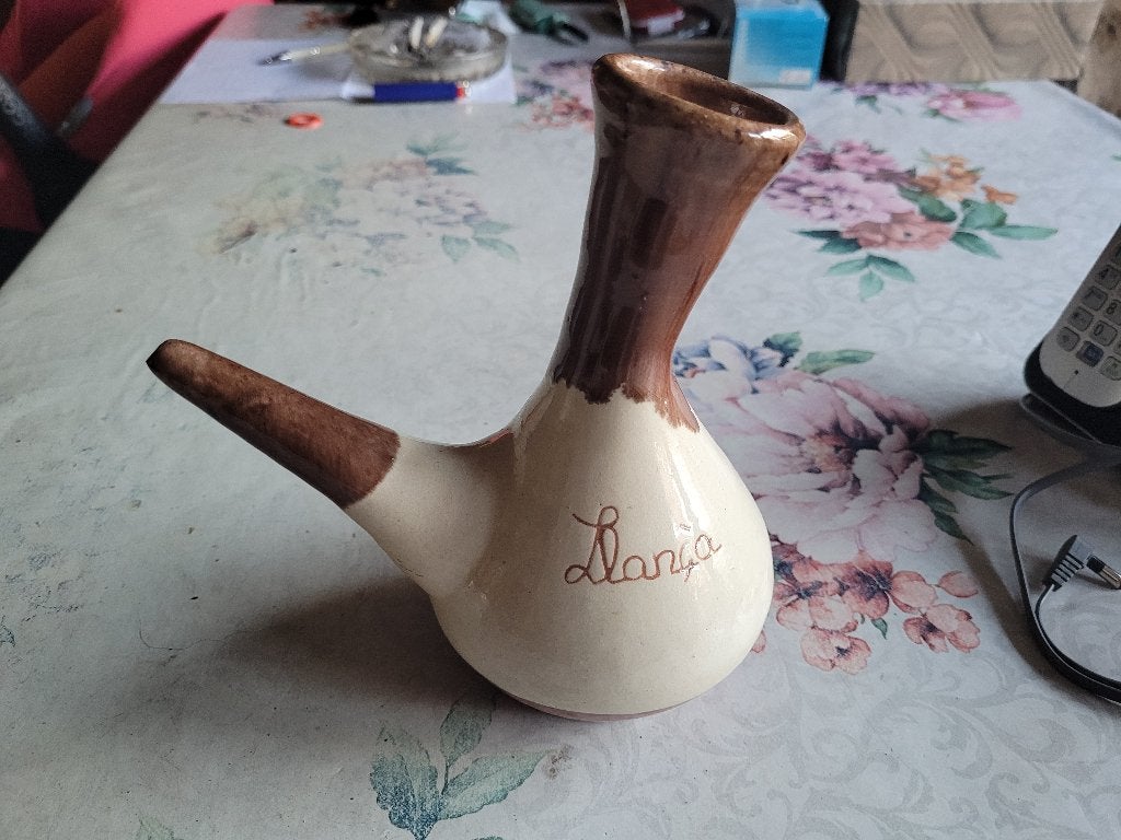 Oliefles / olijfolie, Ophalen