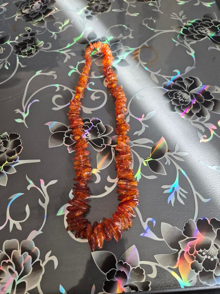 Ketting Amber, Ophalen