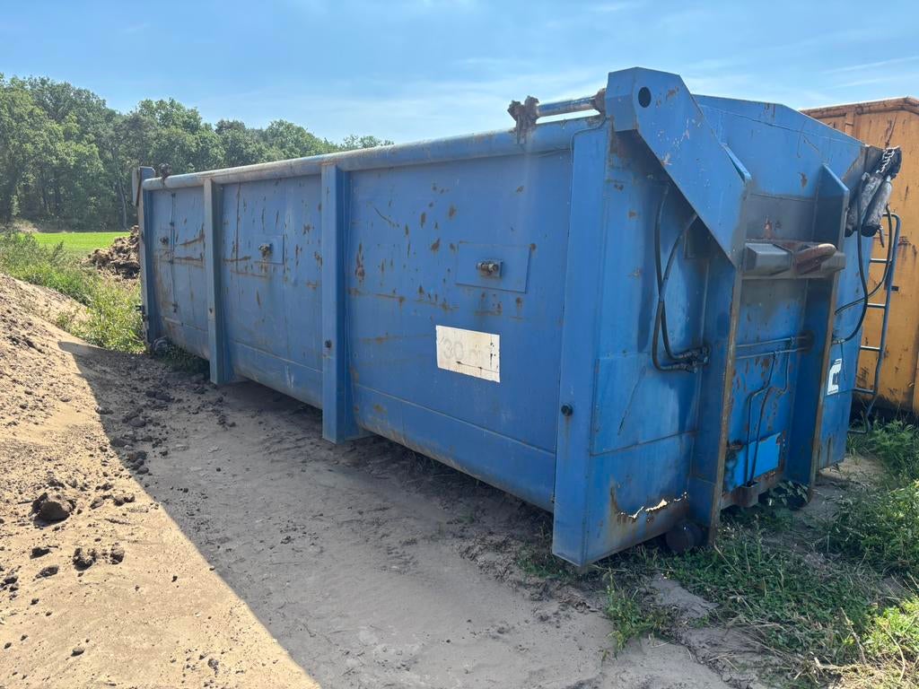 Container haakarm kabelsysteem, Ophalen