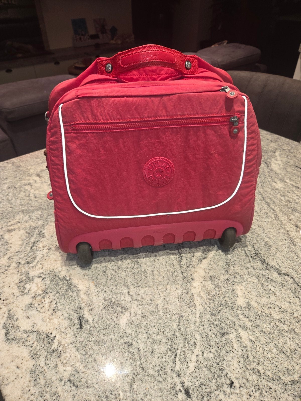 Kipling trolley boekentas, Enlèvement