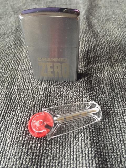 zippo channel zero mid 90's,, Ophalen of Verzenden, Zo goed als nieuw, Aansteker