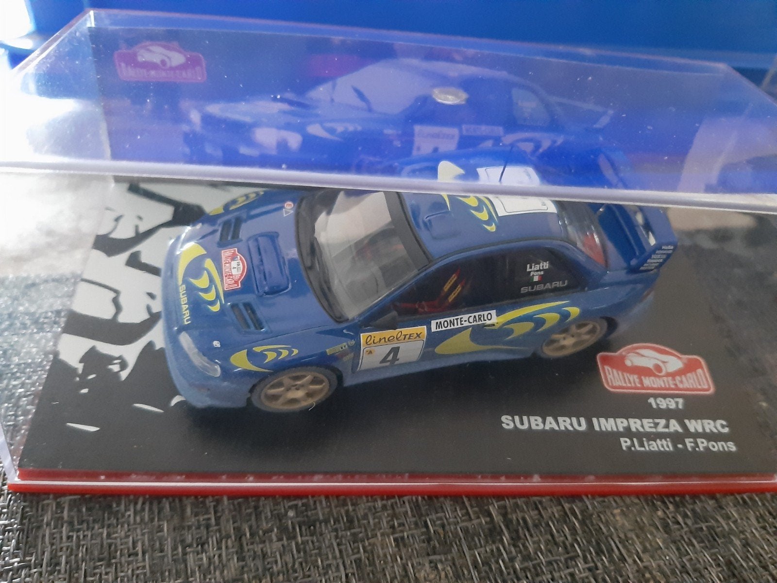 Miniatuur auto 1.43 sabaru impraza WRC, Ophalen of Verzenden, Auto