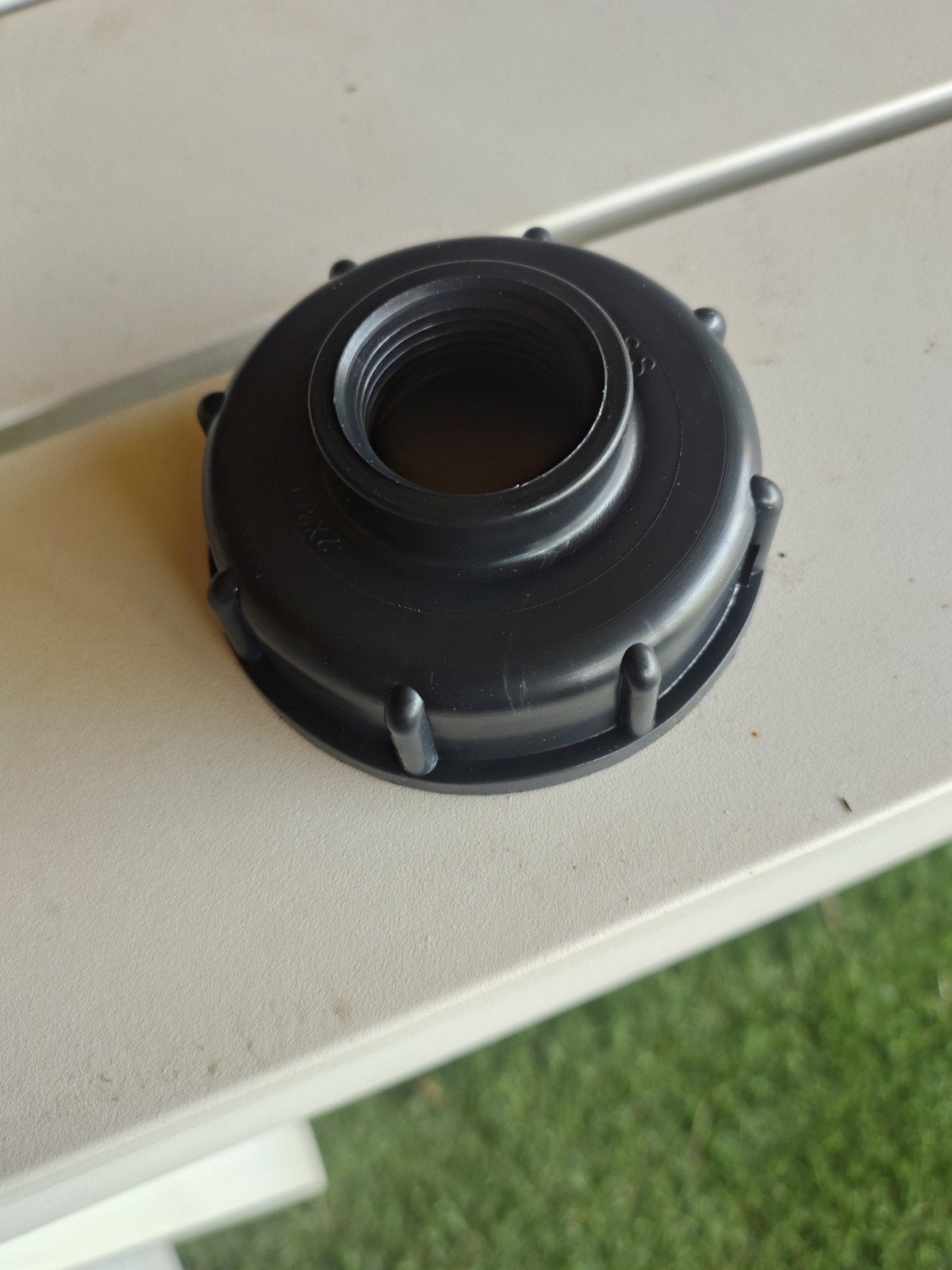 IBC container adapterdop, Ophalen