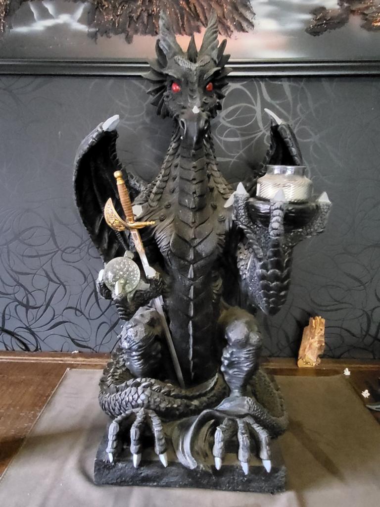 Beeld draak, Ophalen