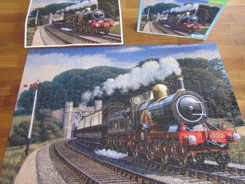 Puzzle du train à vapeur, Enlèvement ou Envoi, 500 à 1500 pièces, Comme neuf, Puzzle