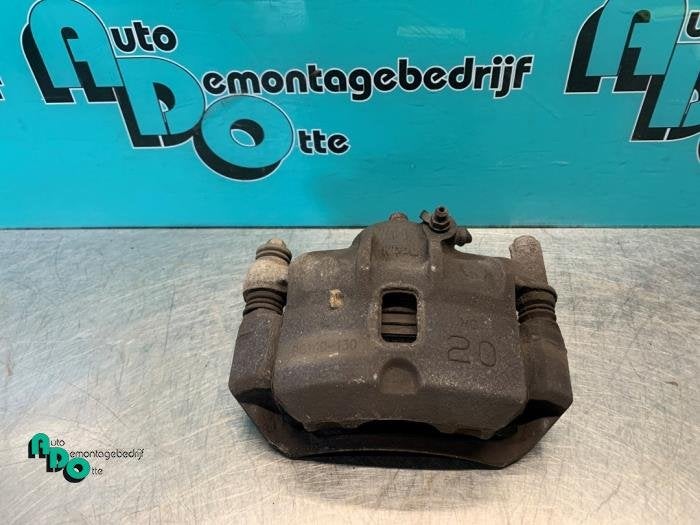 Etrier de frein (pince) avant gauche d'un Hyundai I10 (I10 0, -, 3 mois de garantie, Utilisé, Hyundai
