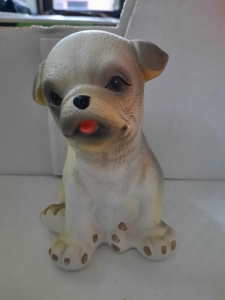 Beeldje hond, Ophalen
