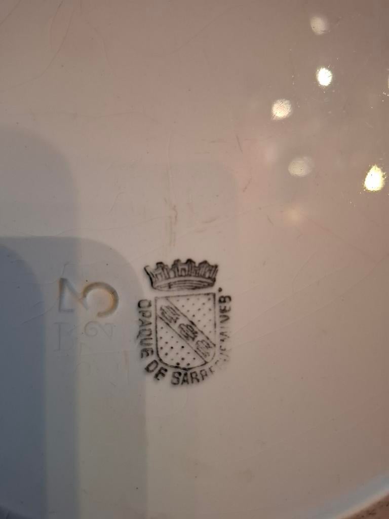 Opaque de sarrequemines héél oud bord, Enlèvement