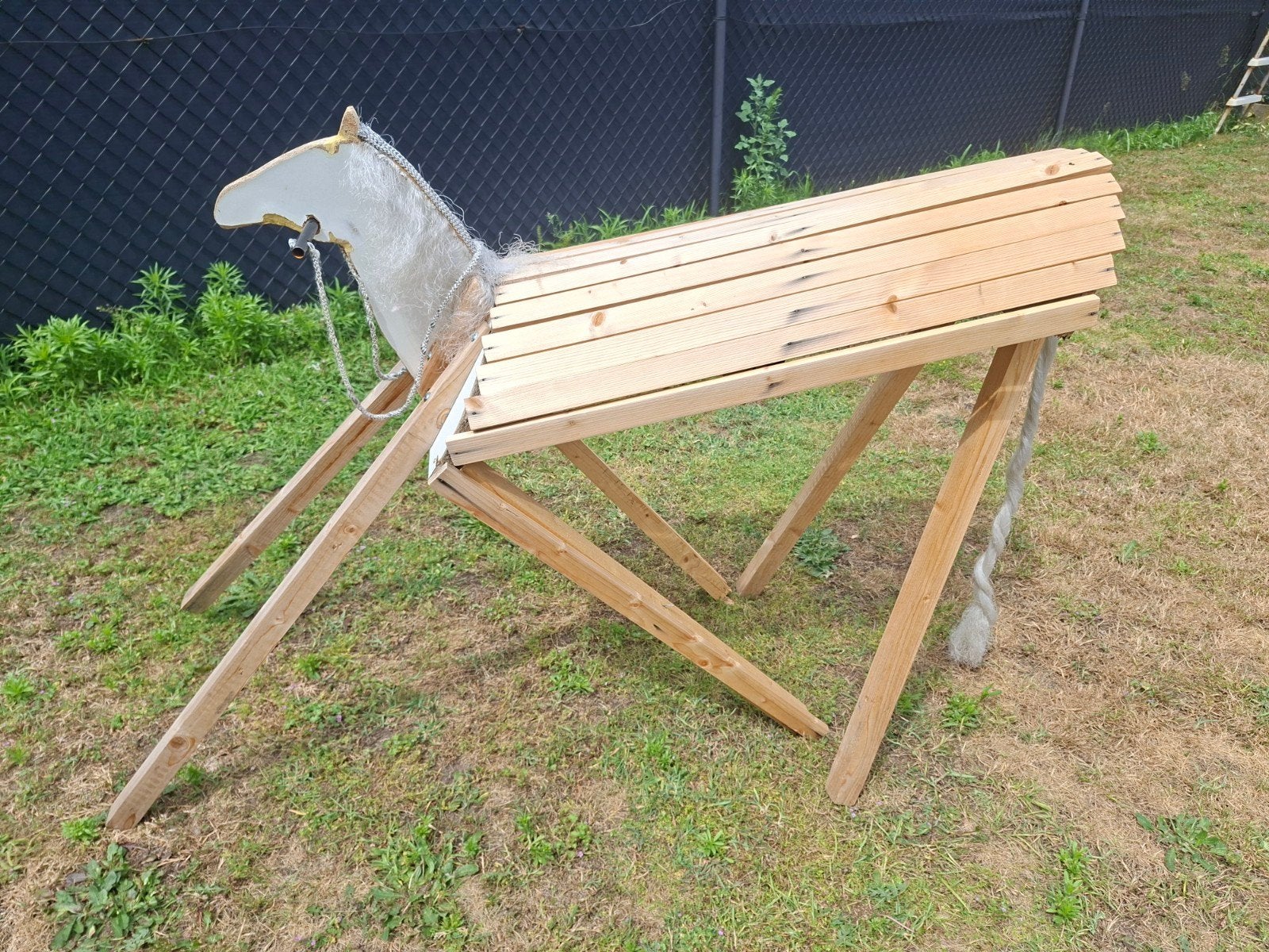 Houten paard, Ophalen