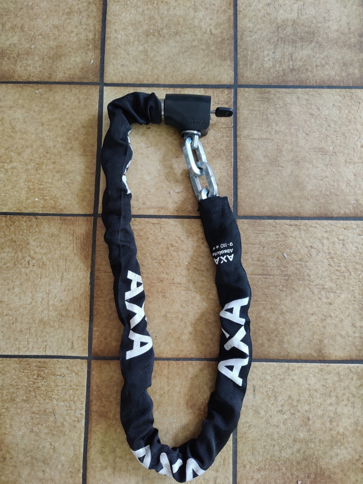 kettingslot axa 9-110, Enlèvement