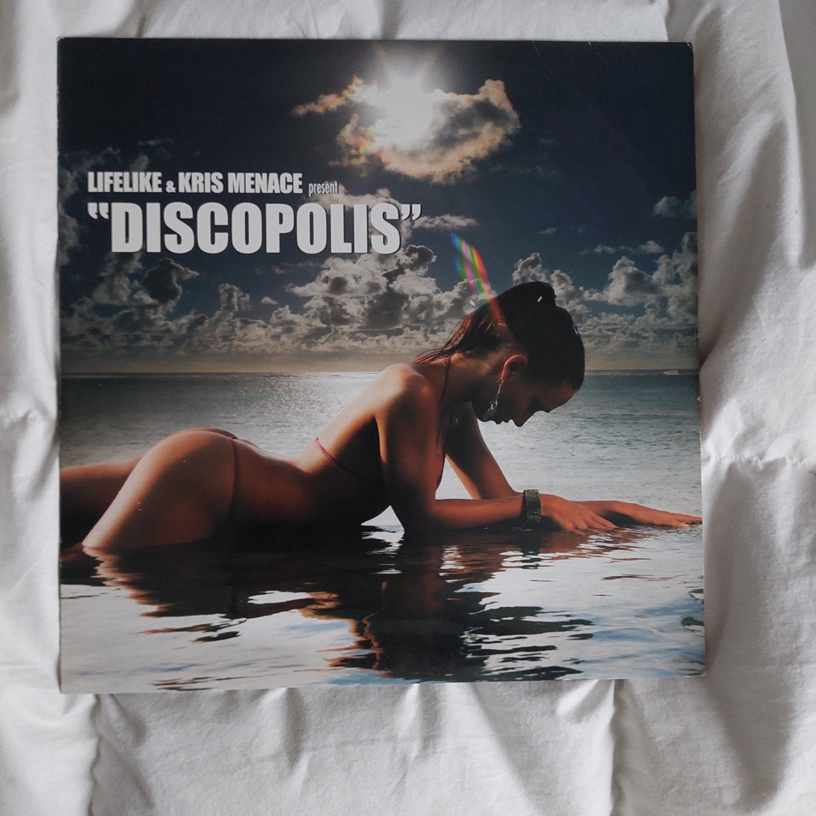 Maxi Single Lifelike & Kris Menace Discopolis, CD & DVD, Enlèvement ou Envoi, Comme neuf, Dance, Single
