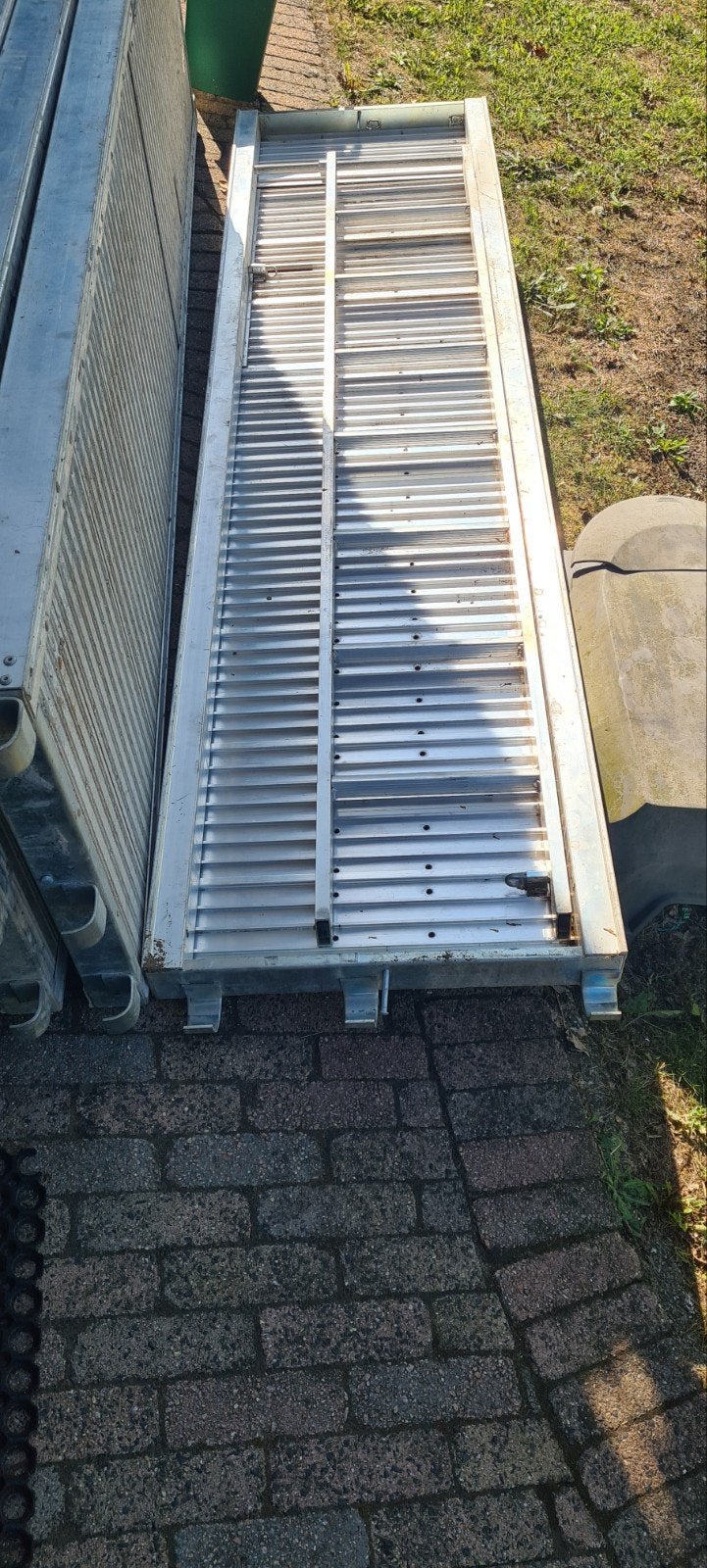 5 aluminium loopplanken, Ophalen