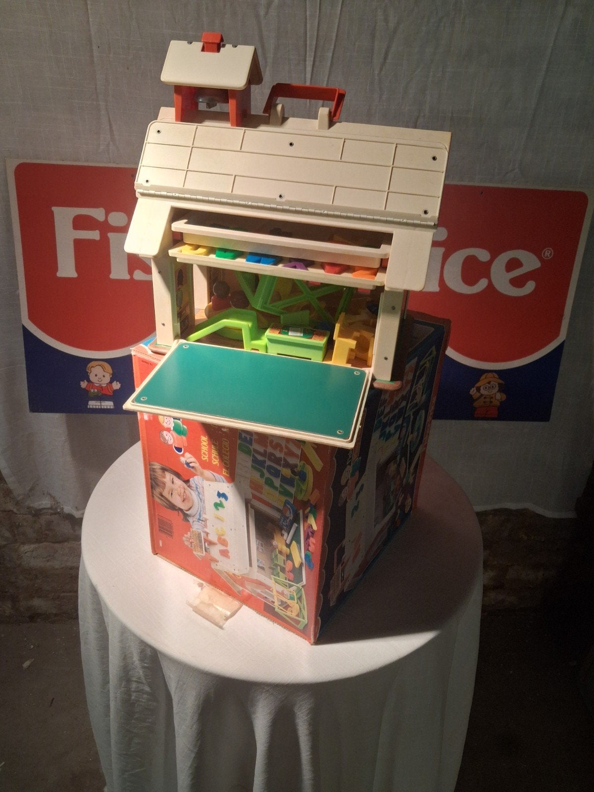 fisher price schooltje, Ophalen