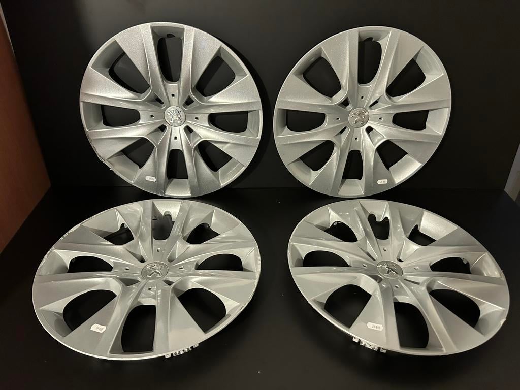 4 originele Peugeot 207,208,307,308 partner 15" wieldoppen, Ophalen of Verzenden, Zo goed als nieuw