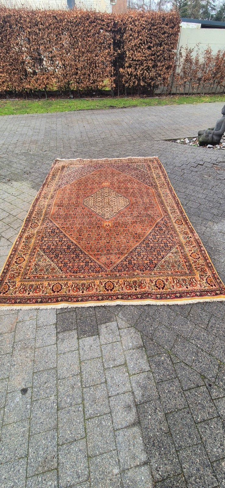 Oosterse tapijt, Ophalen