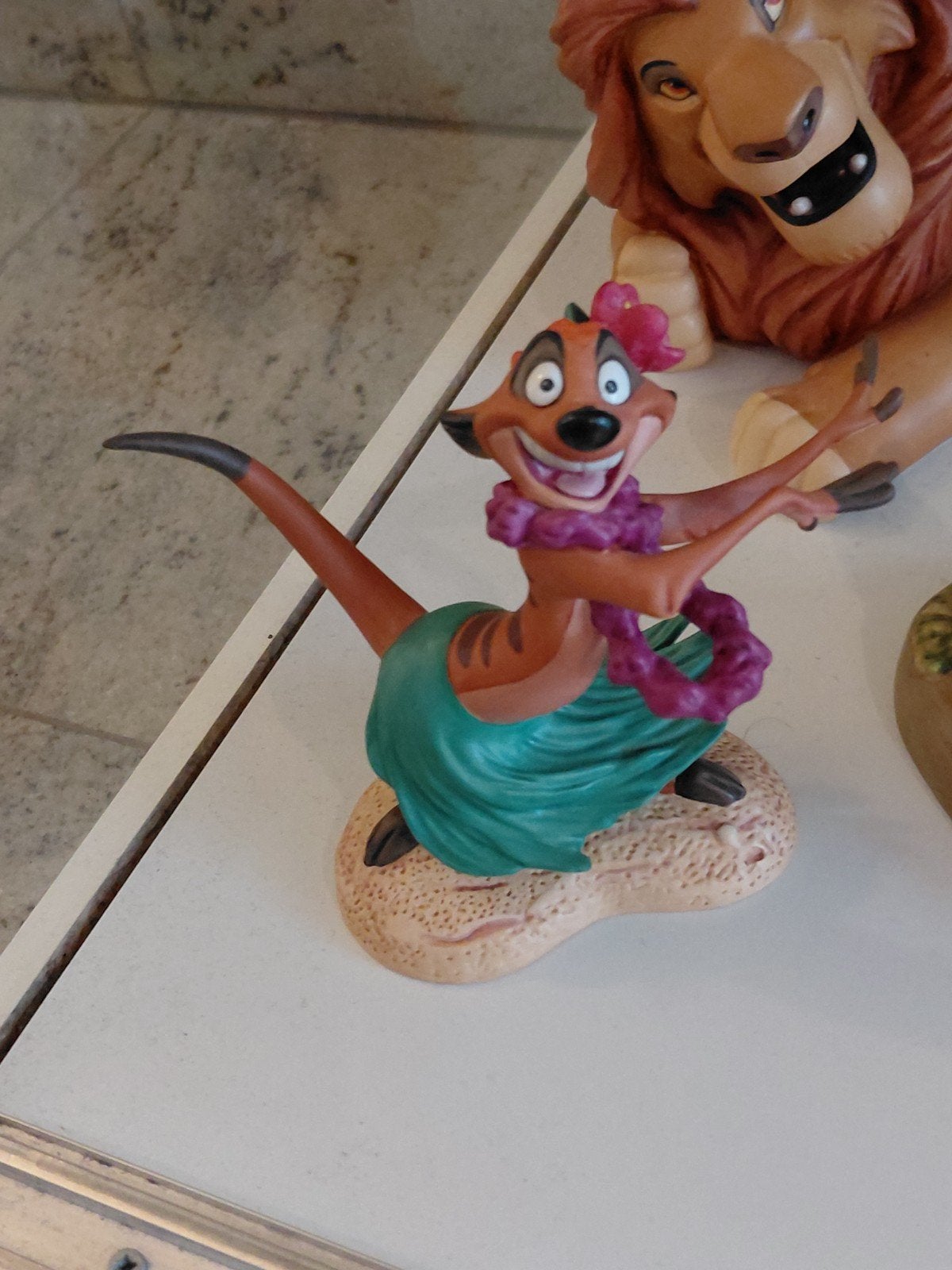 le roi lion, Timon, Luau, Enlèvement ou Envoi