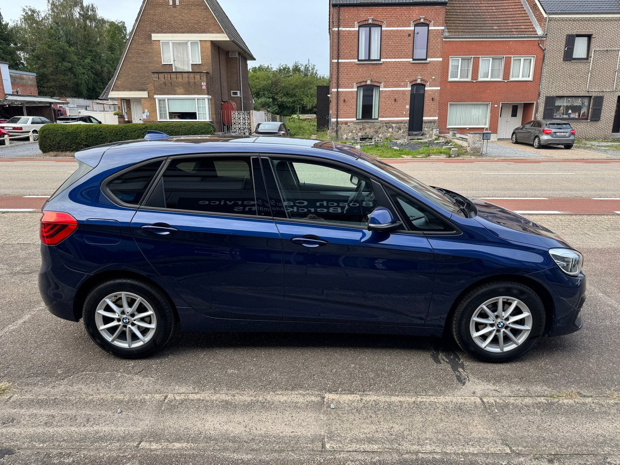BMW 216 Active Tourer 1.5 Benzine + Panoramisch dak, Auto's, Voorwielaandrijving, Stof, Gebruikt, Blauw