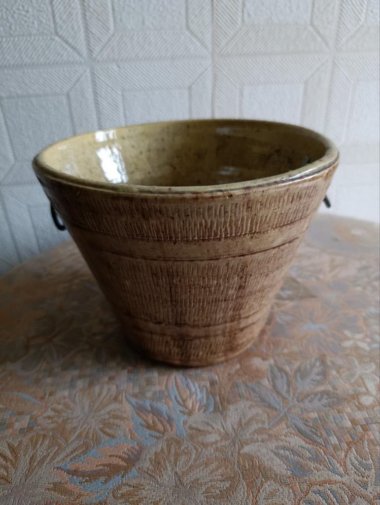 Gelakte bloempot om op te hangen, Ophalen