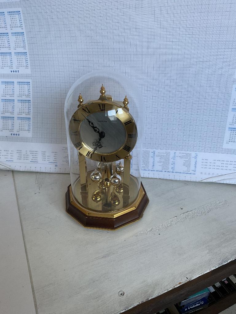 DUGENA Pendule à balancier, Enlèvement