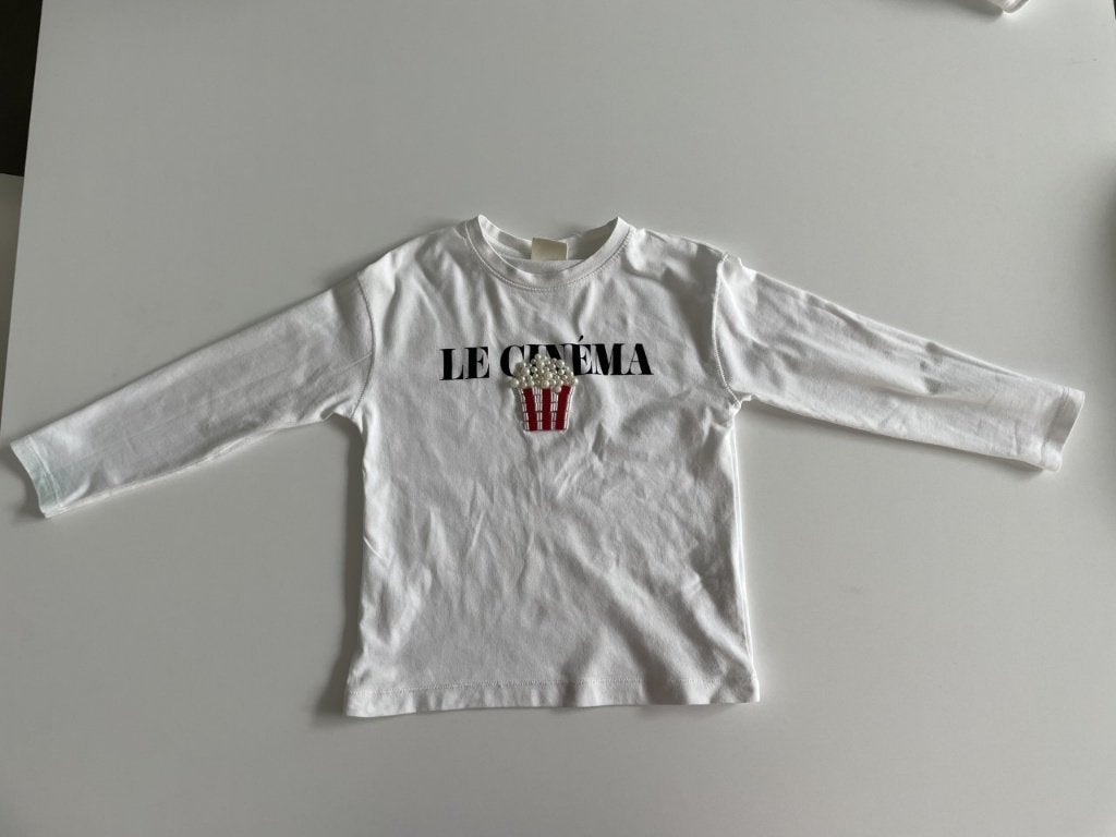 Witte t-shirt popcorn maat 110, klein vlekje onderaan, Kinderen en Baby's, Kinderkleding | Maat 110, Gebruikt, Meisje, Ophalen of Verzenden