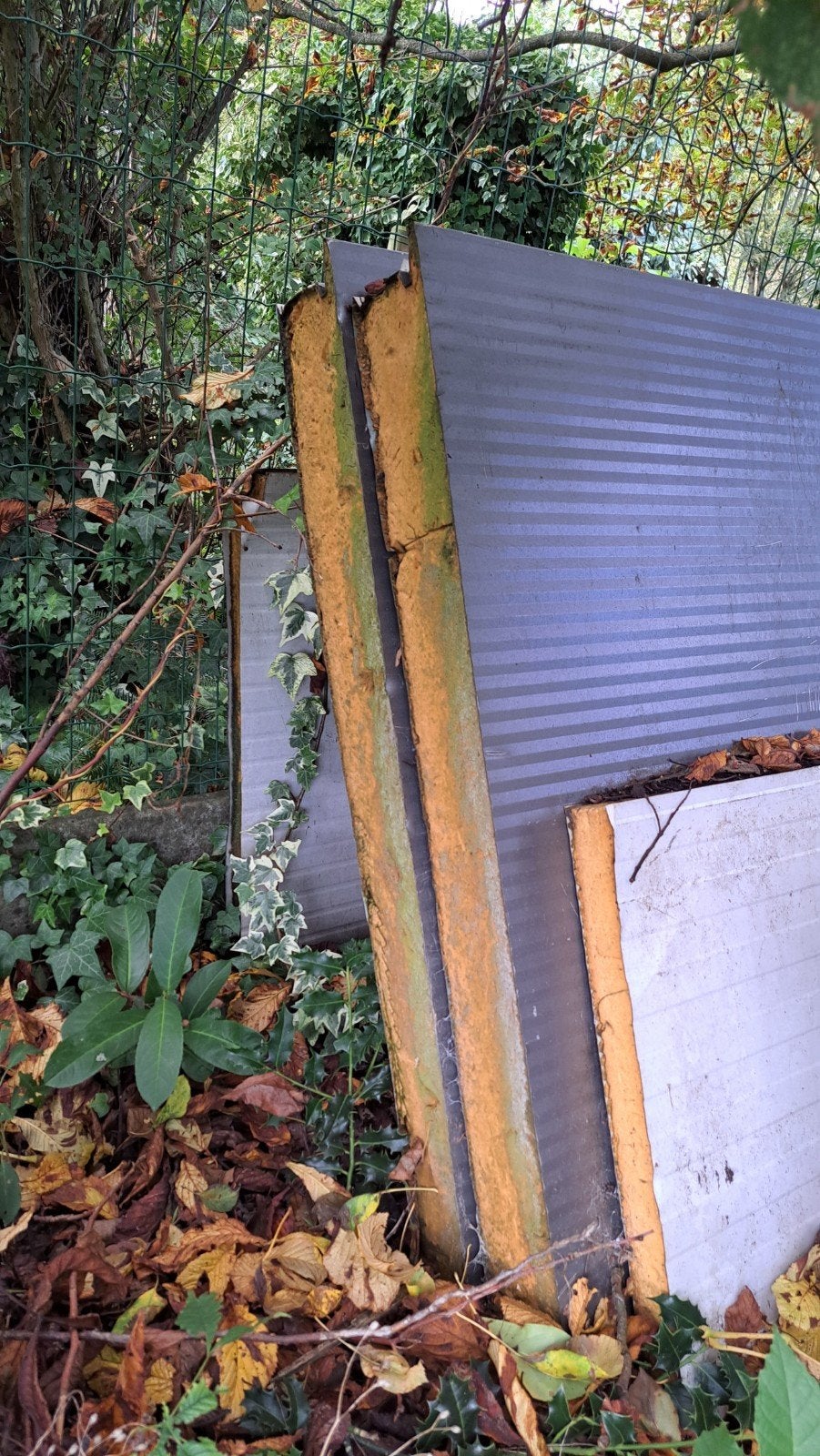 enkele stukken sandwichpanelen ongeveer 2 meter lang, Enlèvement