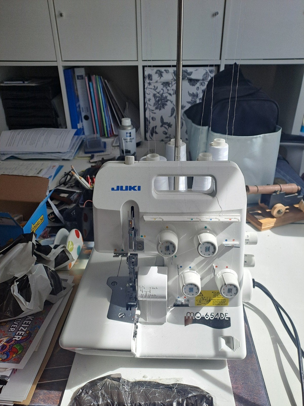 overlock JUKI, Ophalen