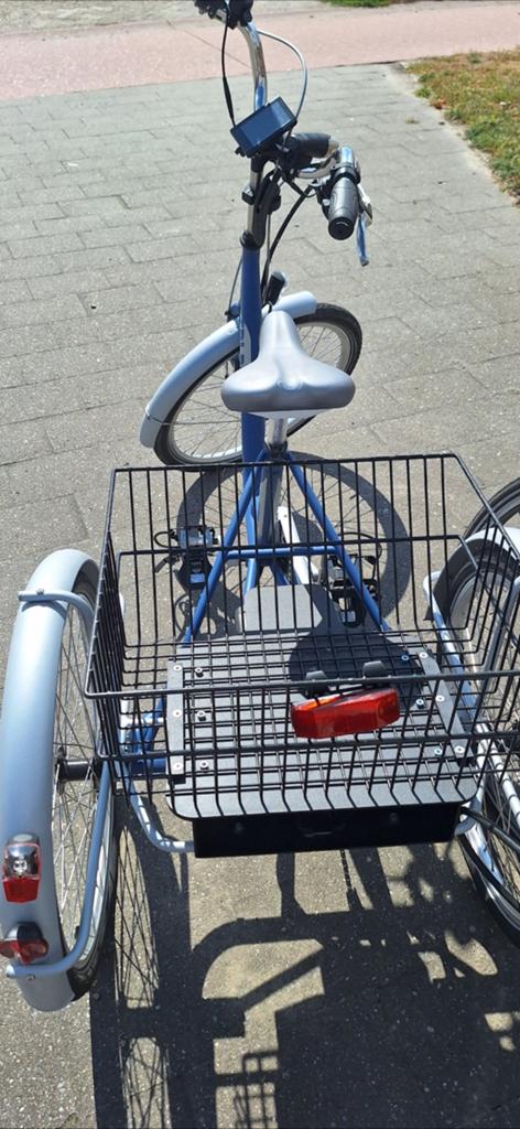 Elektrische driewieler fiets, Ophalen