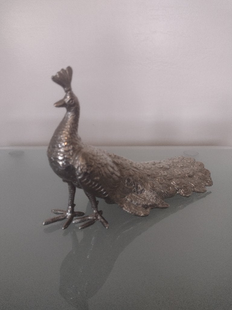 Figurine de paon vintage, Enlèvement