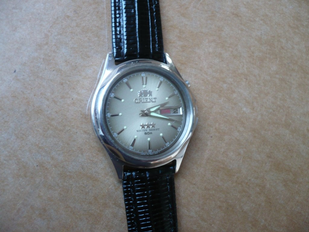 Horloge orient automatic heel goede staat., Handtassen en Accessoires, Ophalen of Verzenden, Leer