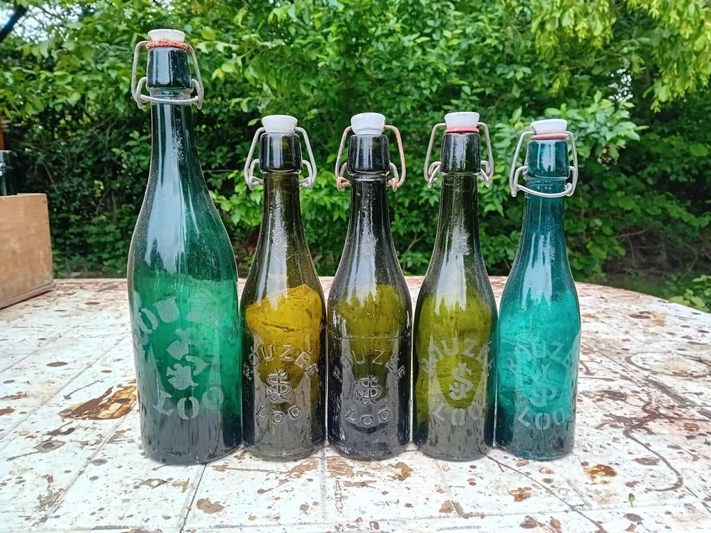 Oude vintage bierflessen brouwerij Rouzée Lo Loo Reninge, Ophalen of Verzenden