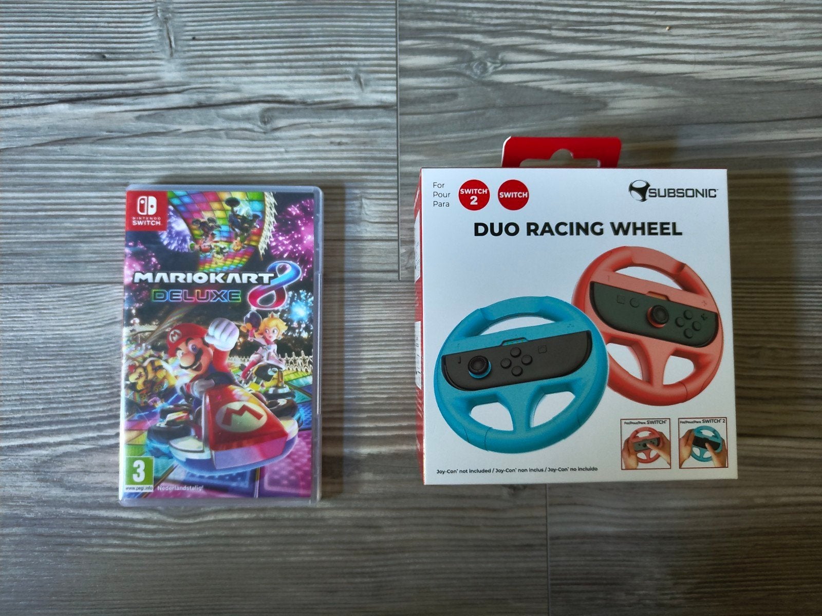 Mario Kart 8 Deluxe + Nieuwe Subsonic Duo Racing Wheels, Ophalen of Verzenden