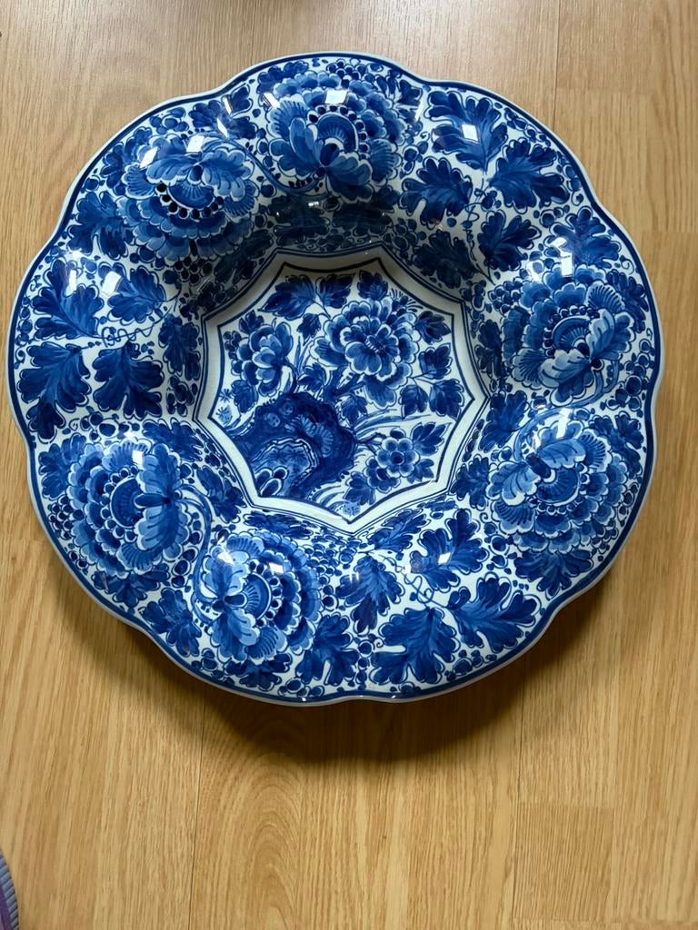 Wandschaal van Delft, Ophalen
