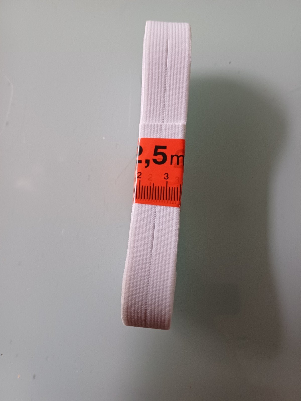 knoopsgatelastiek 18mm  2.5 meter, Ophalen of Verzenden, Lint, Band of Elastiek