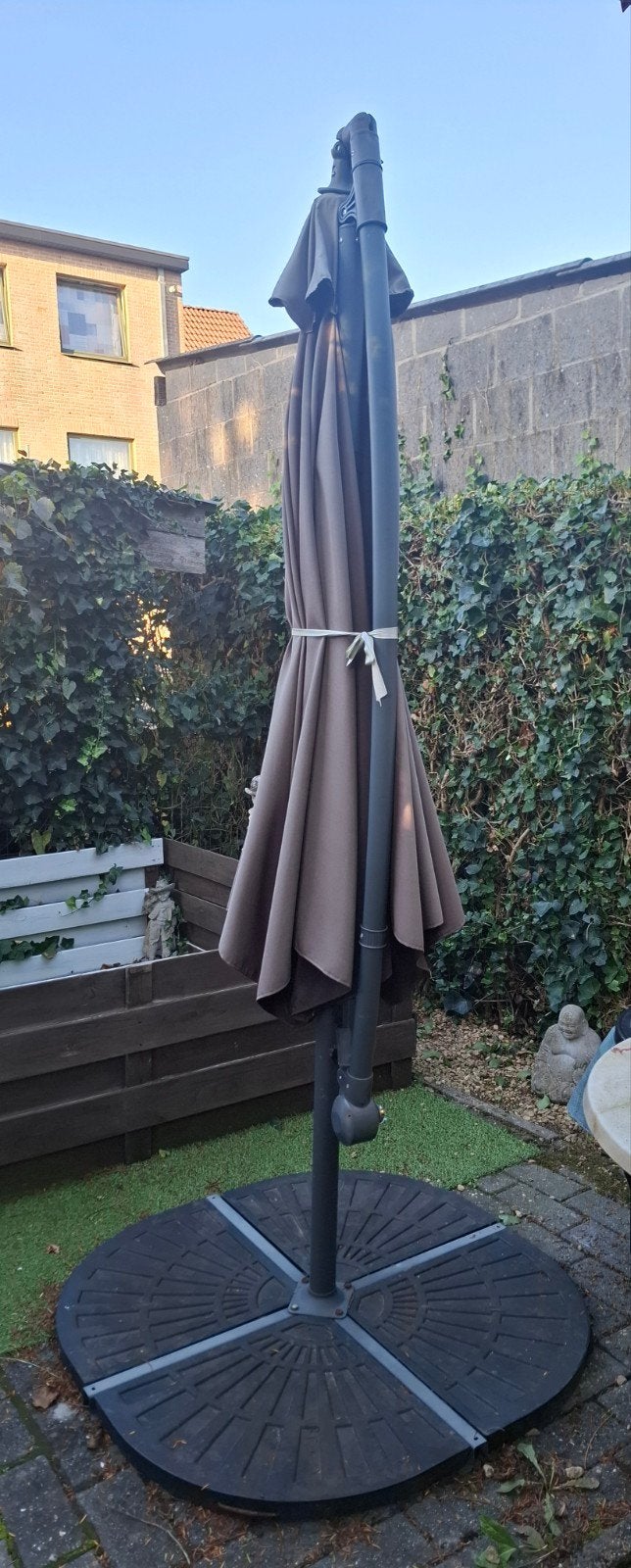 parasol met voet, Ophalen