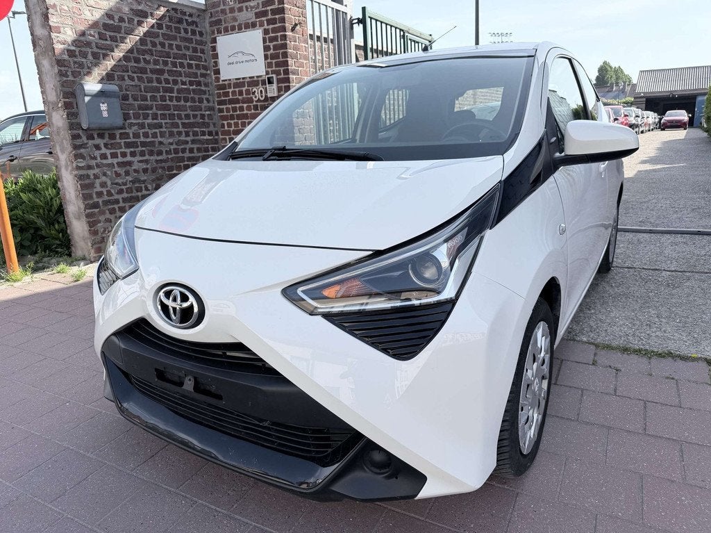 Toyota Aygo 1.0 I EDITION | Carplay | Cruise | Achteruitrijc, Auto's, Toyota, 4 zetels, Stof, Gebruikt, Overige kleuren