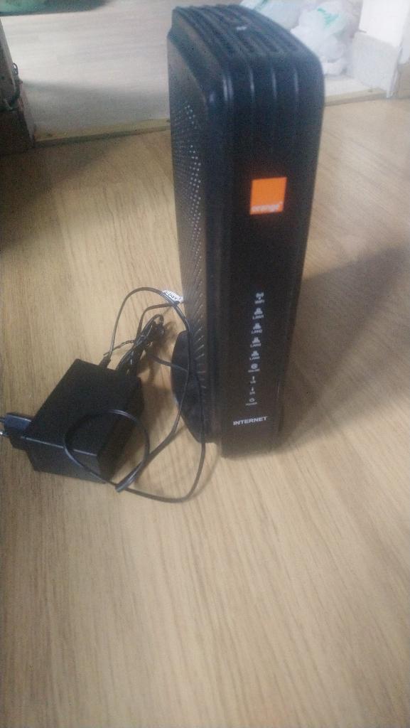 Oranje modem TCG300, Computers en Software, Ophalen of Verzenden, Zo goed als nieuw, Router met modem, Orange