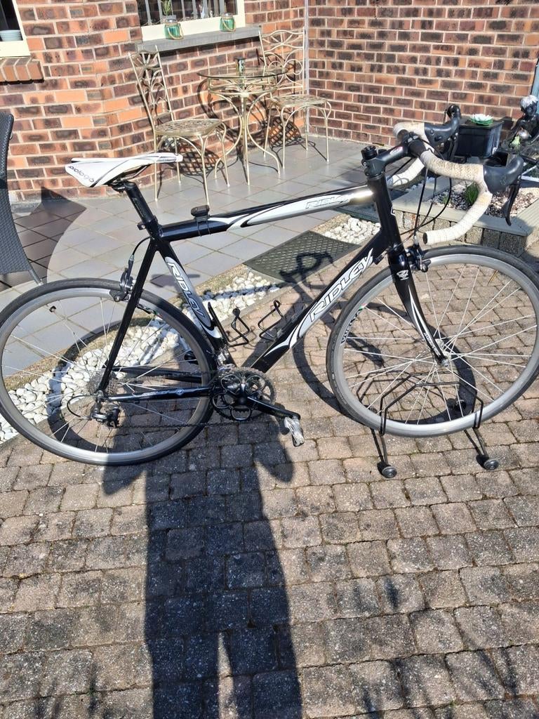 Racefiets maat 56 heeft op de rollen gestaan, Fietsen en Brommers, Ophalen
