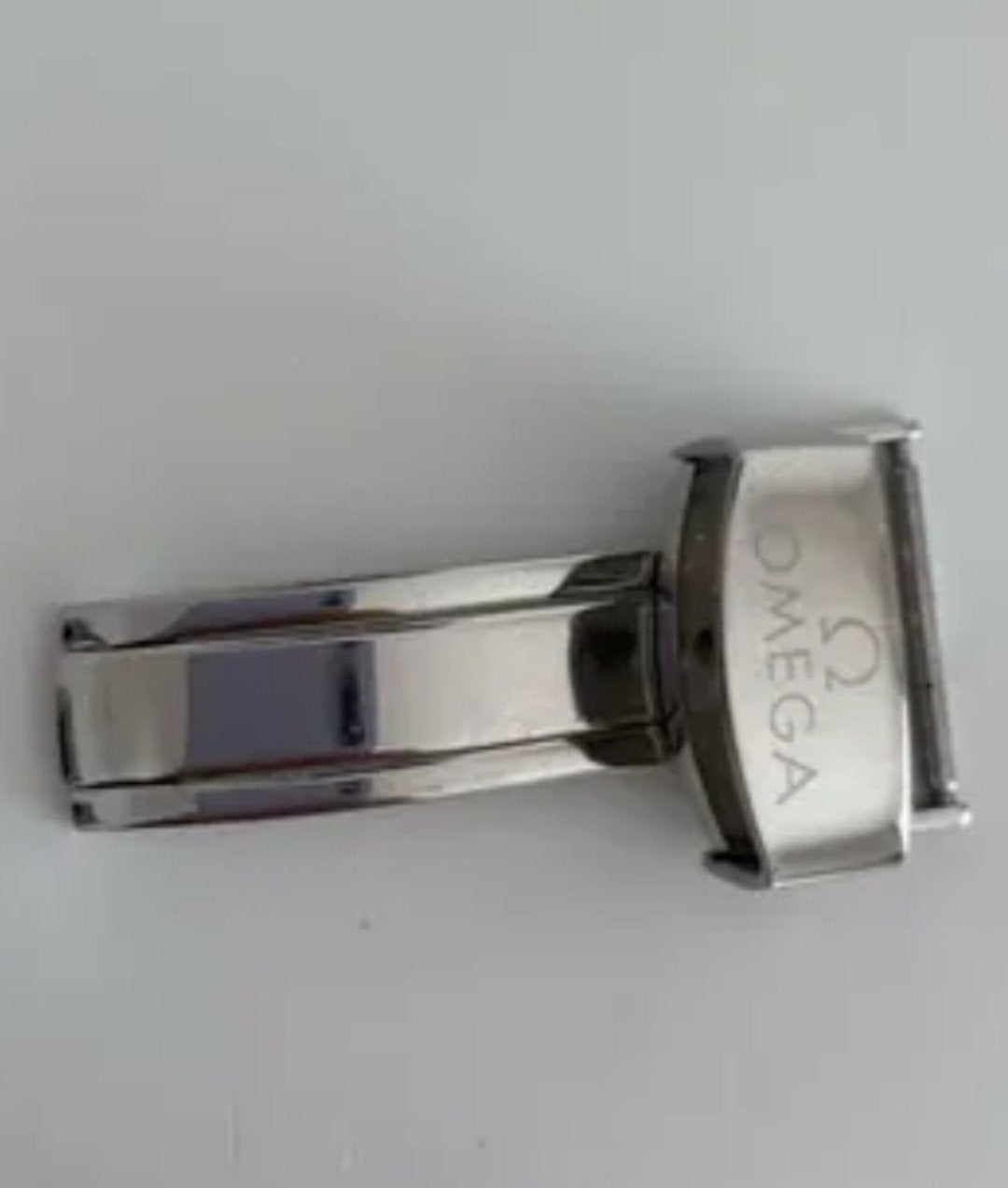 Clip pliant Omega en acier inoxydable, Handtassen en Accessoires, Ophalen of Verzenden, Zo goed als nieuw