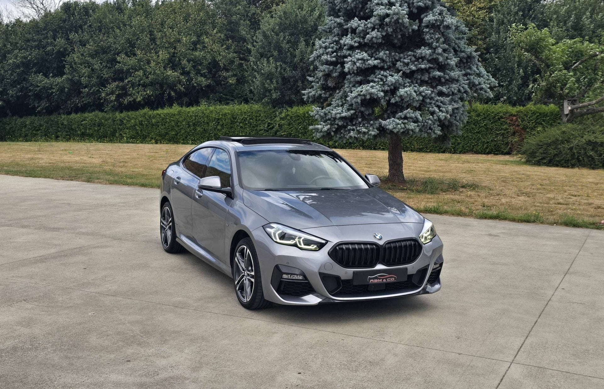 BMW 218 i Gran Coupe * Pack M - CAM - CarPlay * GAR 12M, Auto's, Dealer onderhouden, Gebruikt, 110 g/km, 136 pk