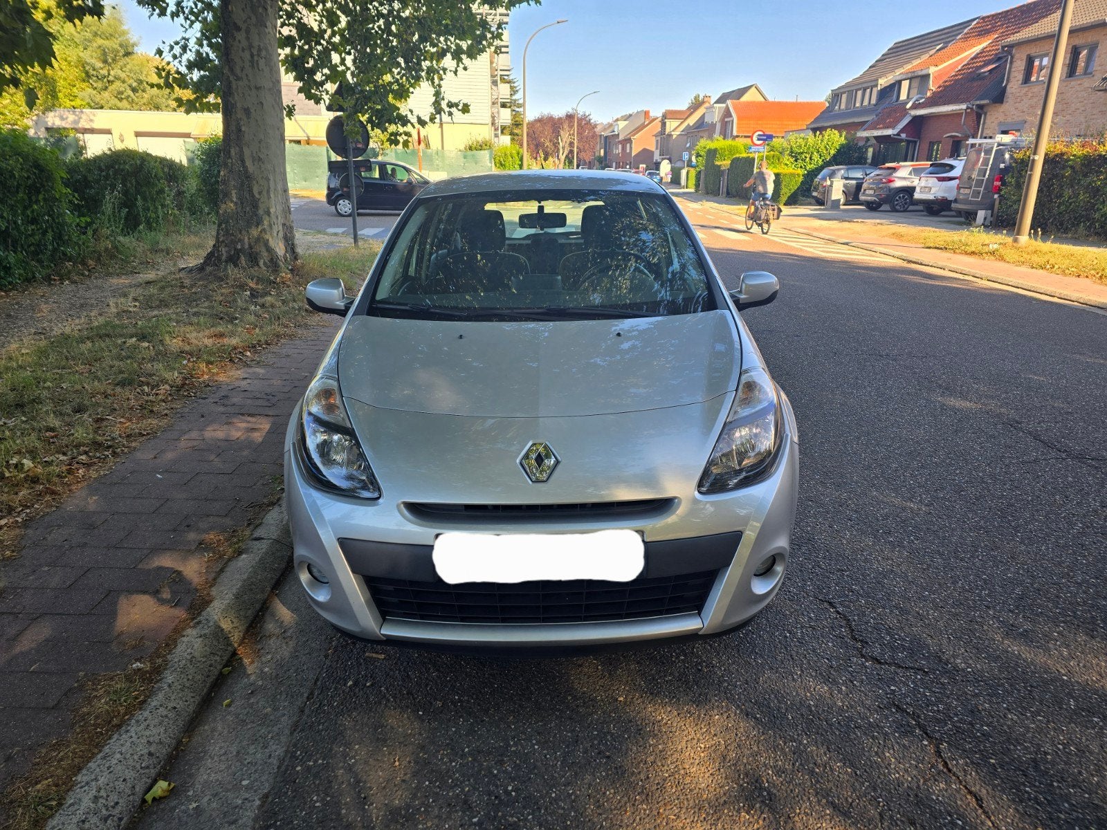 Renault Clio 1.2 Essence Édition TomTom | 2012 | 90 000 km, Boîte manuelle, Entretenue par le concessionnaire, Noir, 5 portes