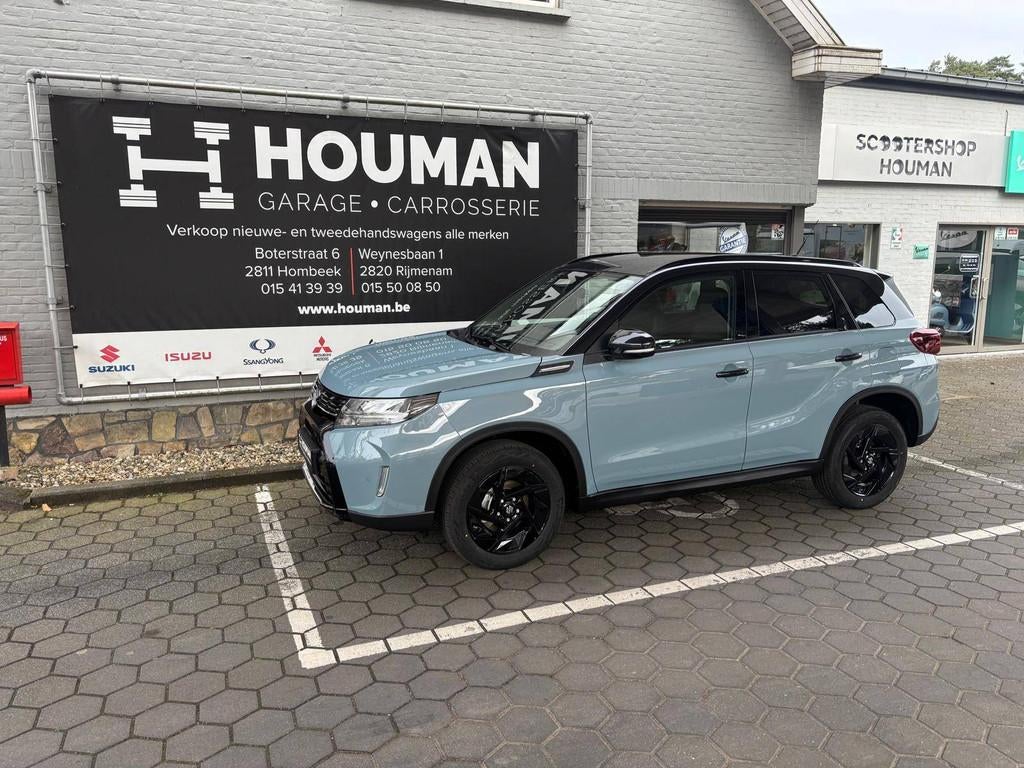 Suzuki Vitara 1.4 2WD Tsuki Manueel, Auto's, Suzuki, Blauw, Leder en Stof, Nieuw, Hybride Elektrisch/Benzine