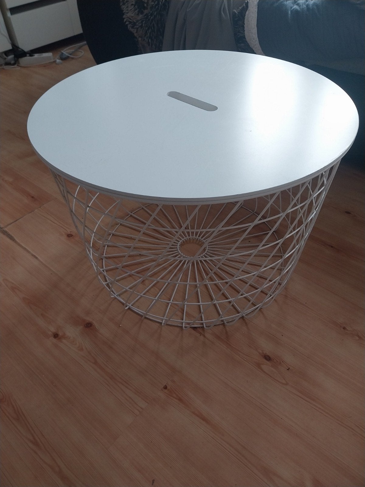 Table basse ronde blanche, Ophalen
