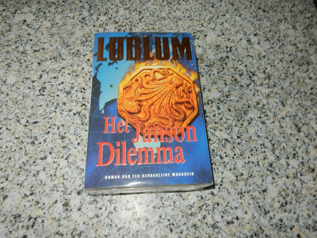 nr.701- Thriller: Het janson dilemma - Ludlum, Ophalen of Verzenden