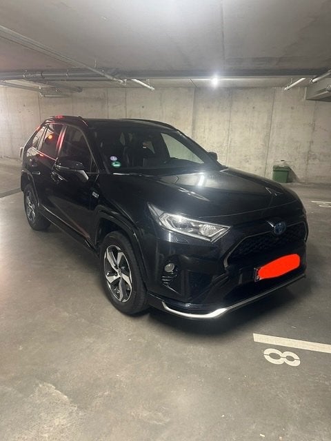Toyota RAV4 PLUG-IN CVT Premium Plus, Auto's, Dealer onderhouden, 4 cilinders, Zwart, Leder