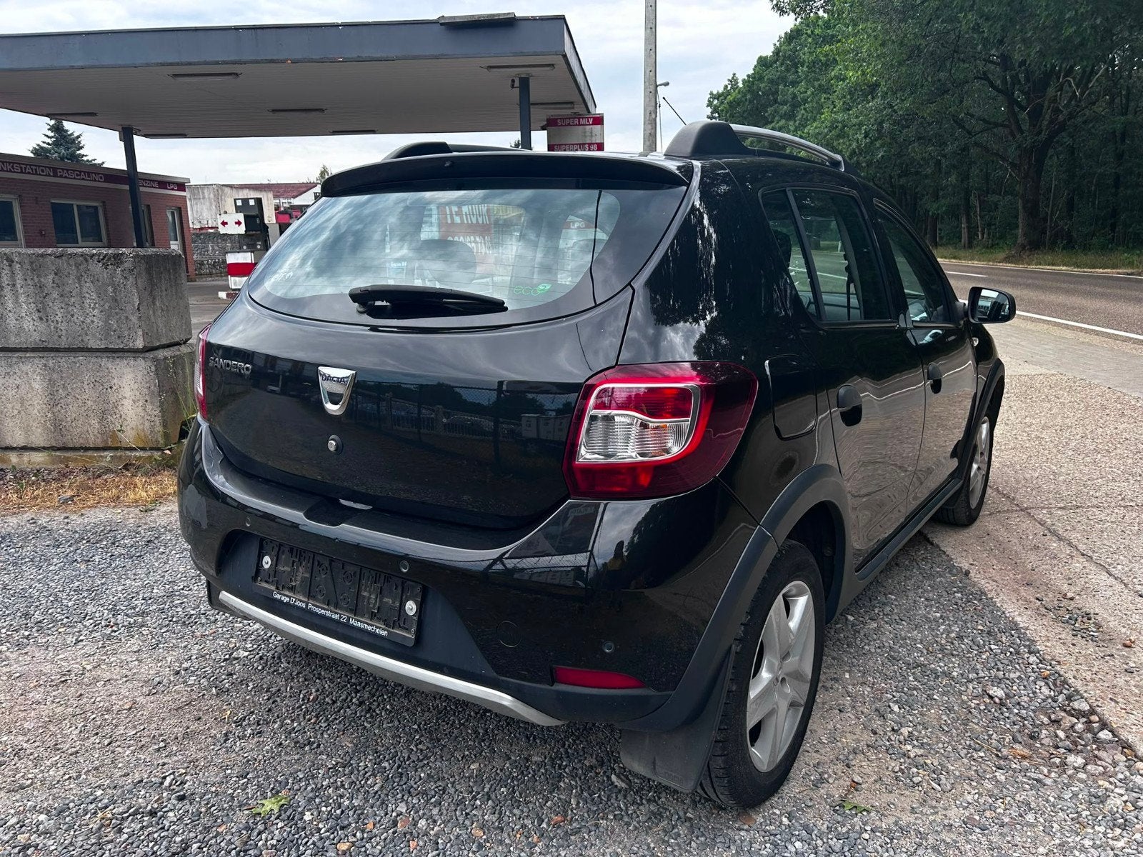 Dacia Sandero Stepway  73000 km bij 2013, Auto's, Voorwielaandrijving, Stof, Zwart, Bedrijf