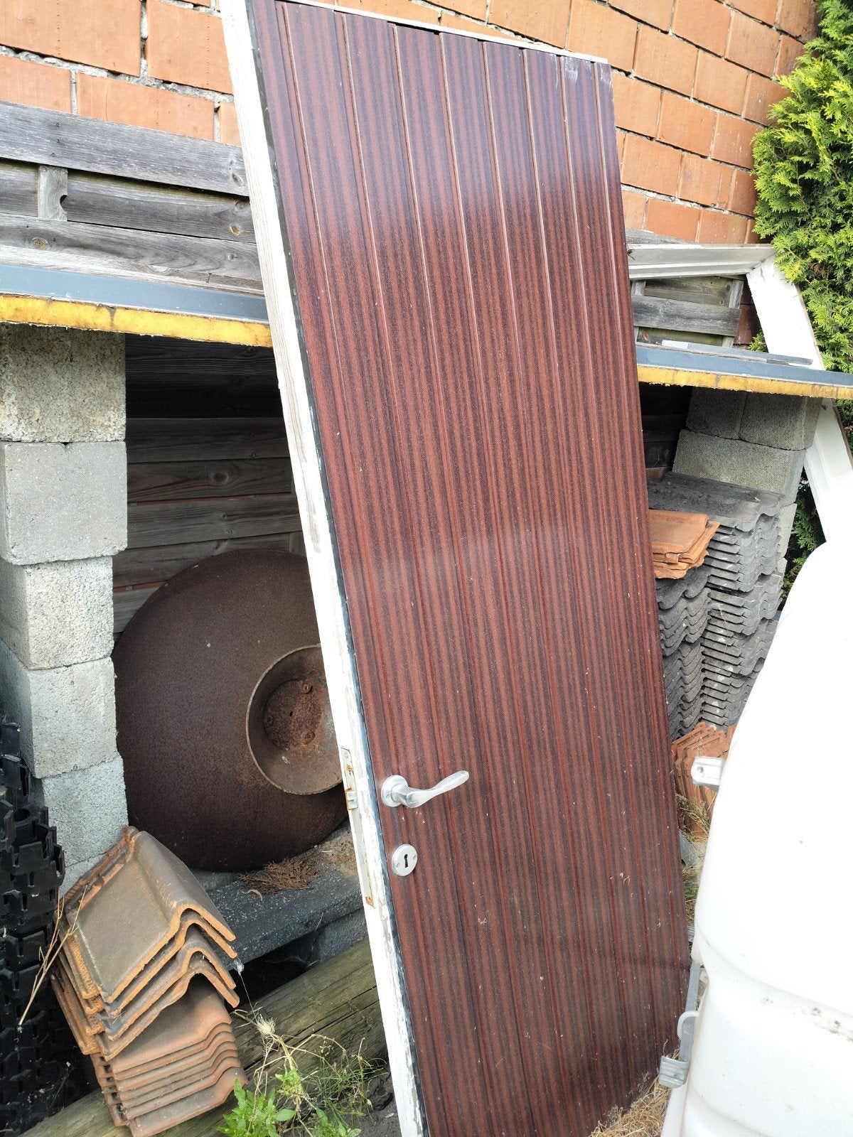 PVC deur buiten, Ophalen